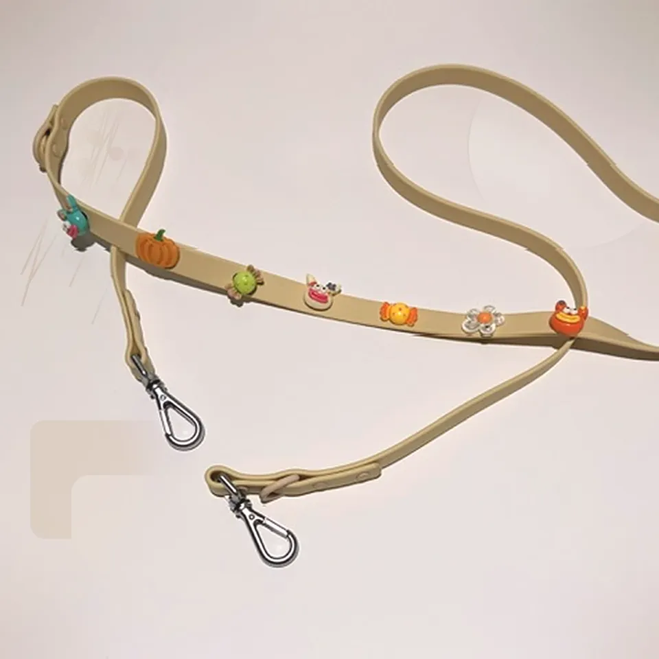 Beige Wag & Charm leash decorated with colorful charms
